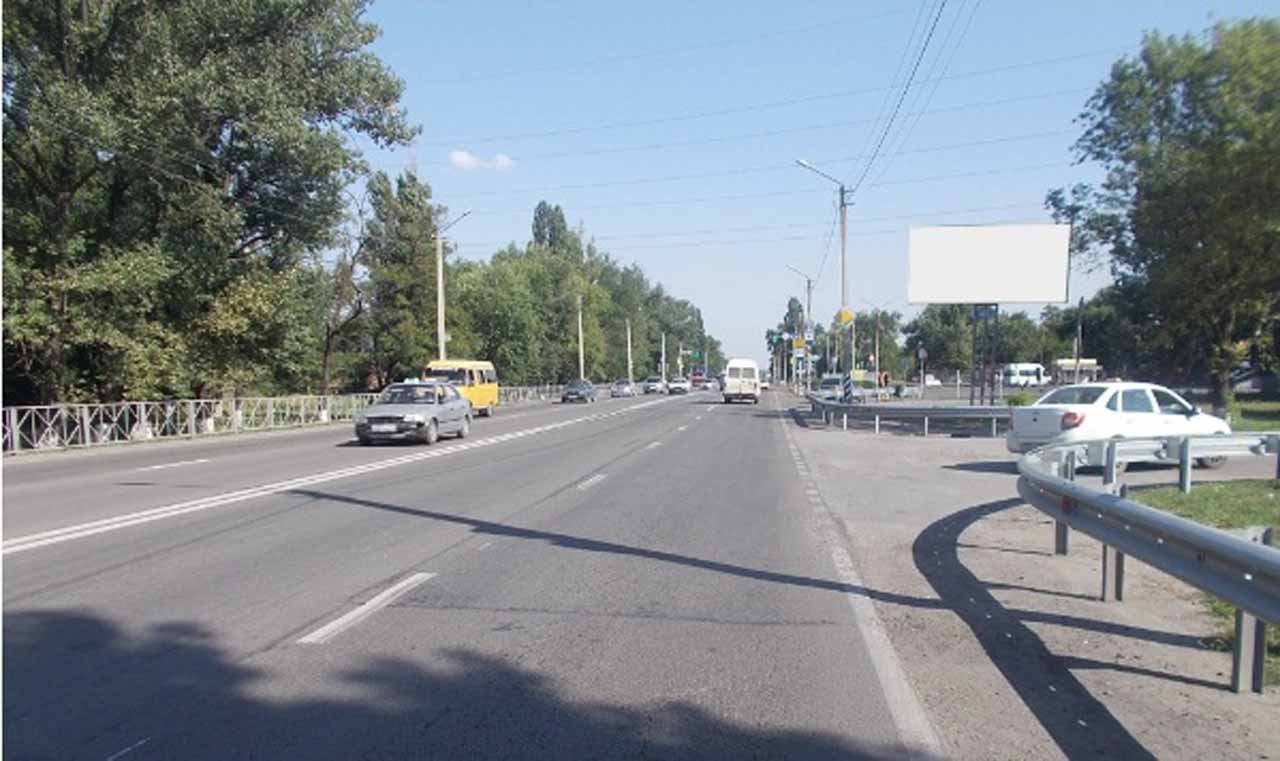 Фотография рекламного носителя, тип: Билборд 3x6, адрес: Харьковская ул., д.81, на 893 600м, Новошахтинск, Ростовская область, Россия. Сторона А №1093620