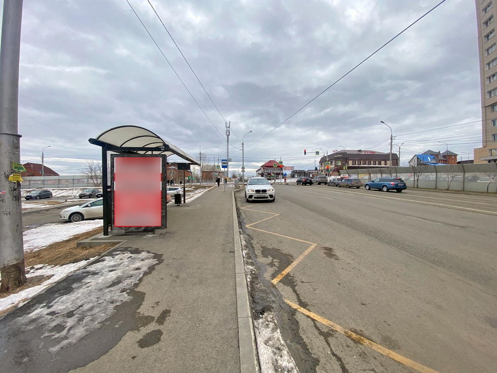 Фотография рекламного носителя, тип: Остановка 1.8x1.2, адрес: Чернышевского ул., д.98, ост. "7-ой микрорайон", Красноярск, Красноярский край, Россия. Сторона Б №1029811