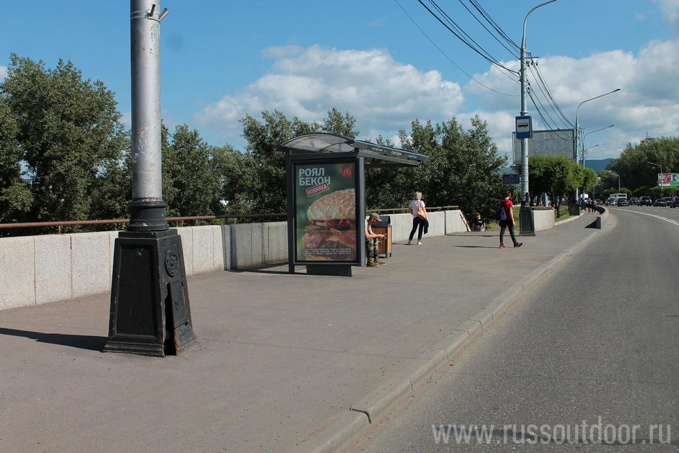 Фотография рекламного носителя, тип: Остановка 1.8x1.2, адрес: Коммунальный мост., ост. "Остров отдыха", Красноярск, Красноярский край, Россия. Сторона Б №328876
