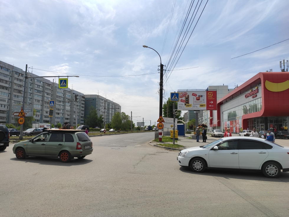 Фотография рекламного носителя, тип: Билборд 3x6, адрес: Рябикова ул., д.106 Х Отрадная ул., Ульяновск, Ульяновская область, Россия. Сторона A №574239