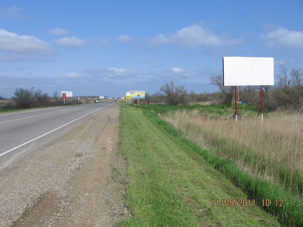 Фотография рекламного носителя, тип: Билборд 3x6, адрес: Темрюк-Порт Кавказ а/д., 2 700м, Краснодарский край, Россия. Сторона А №714726