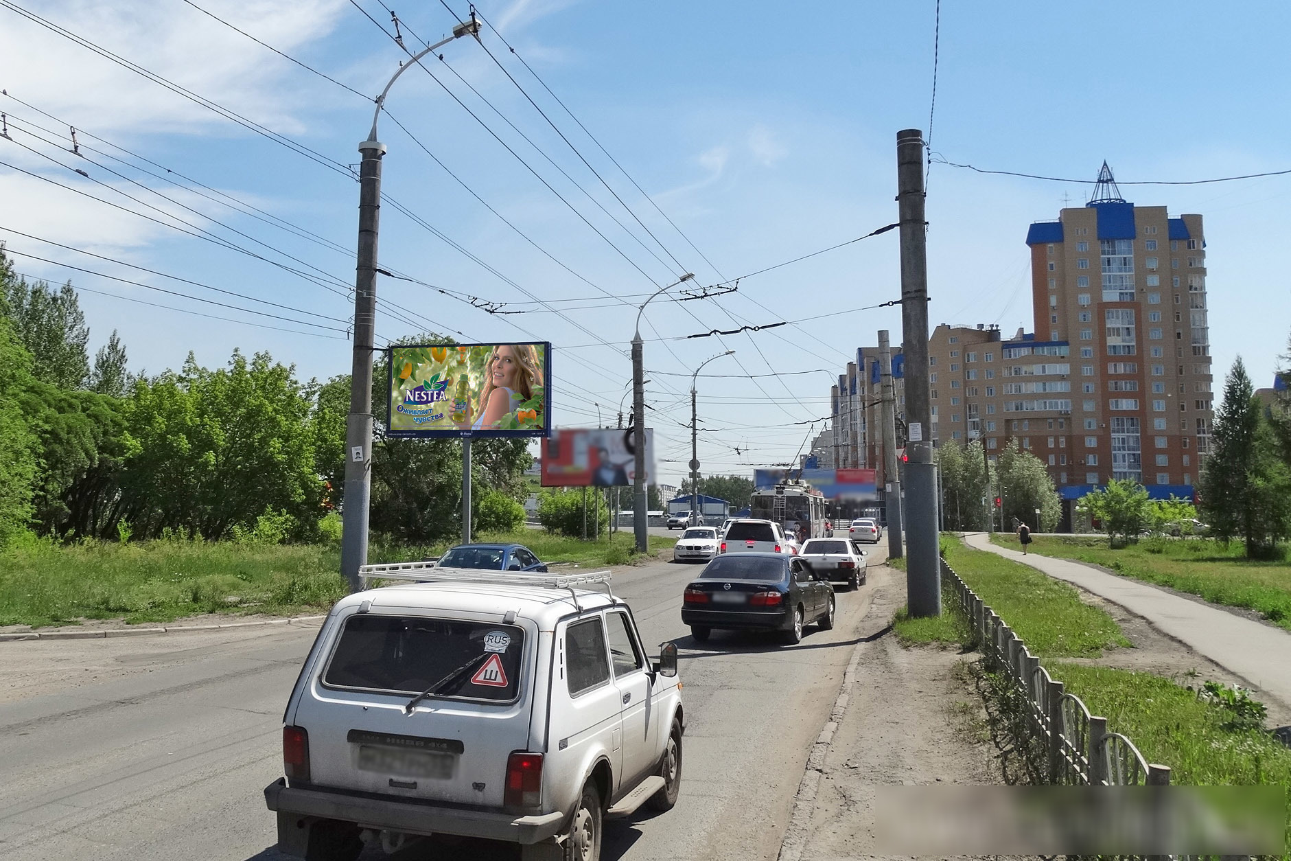 Фотография рекламного носителя, тип: Билборд 3x6, адрес: Комарова пр-т. Х Архитекторов б-р., Омск, Омская область, Россия. Сторона Б №609873