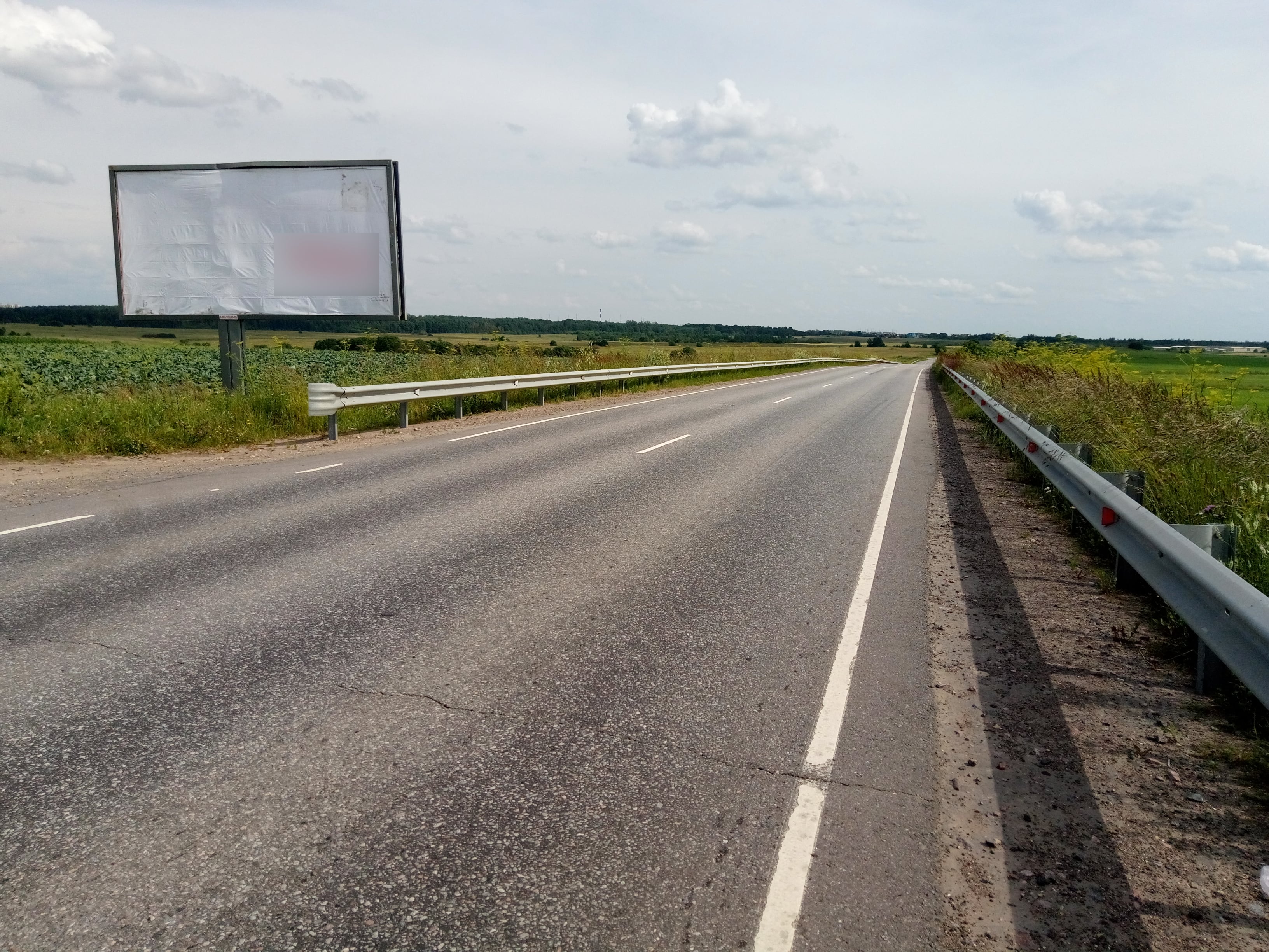 Фотография рекламного носителя, тип: Билборд 3x6, адрес: Аннино - Капорье - Таллинское ш. а/д., 16 100м, Санкт-Петербург, Россия. Сторона Б №666030