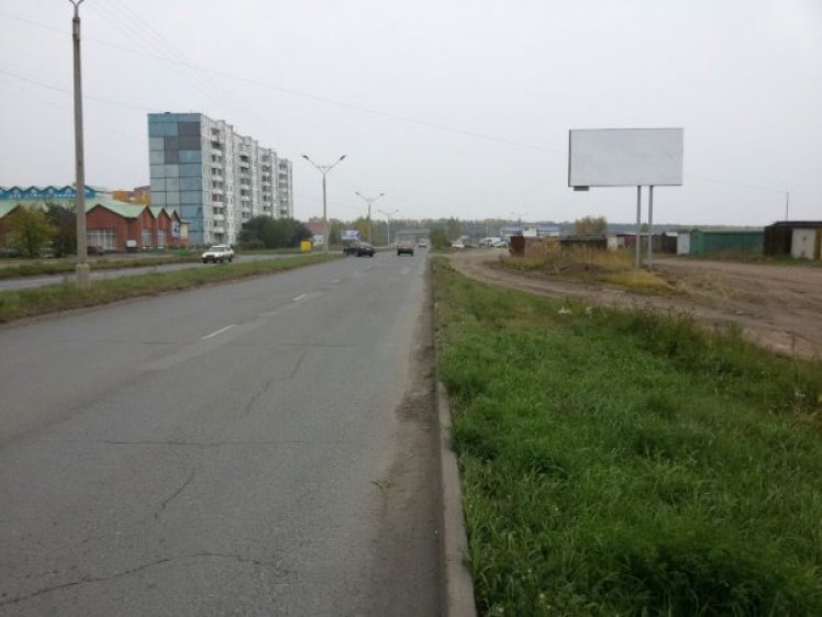 Фотография рекламного носителя, тип: Билборд 3x6, адрес: Шарыпово г., Центральный пр-т., д.7, Красноярск, Красноярский край, Россия. Сторона A №960914