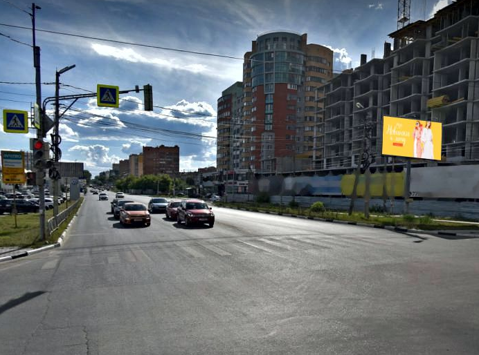 Фотография рекламного носителя, тип: Билборд 3x6, адрес: Есенина ул., д.2А, Рязань, Рязанская область, Россия. Сторона A1-А3 №689120