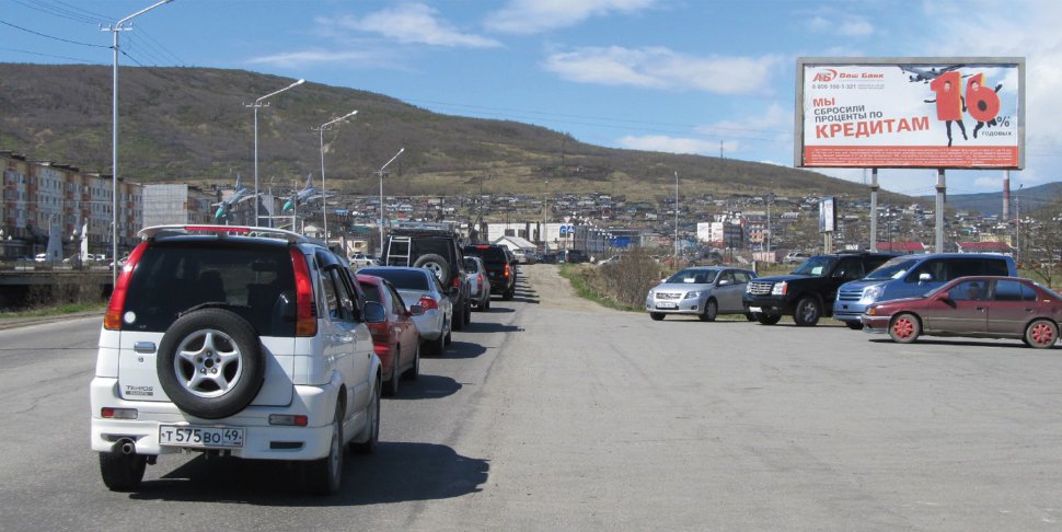Фотография рекламного носителя, тип: Билборд 3x6, адрес: Набережная р. Магаданки, д.9, Магадан, Магаданская область, Россия. Сторона A №1075126