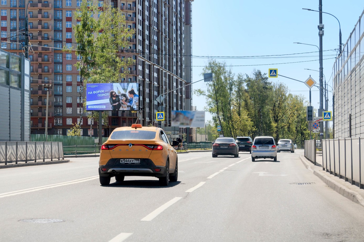 Фотография рекламного носителя, тип: Билборд 3x6, адрес: Проектируемый пр-зд. 389, на въезде в ЖК Рассказово, Москва, Россия. Сторона Б1 №1068121