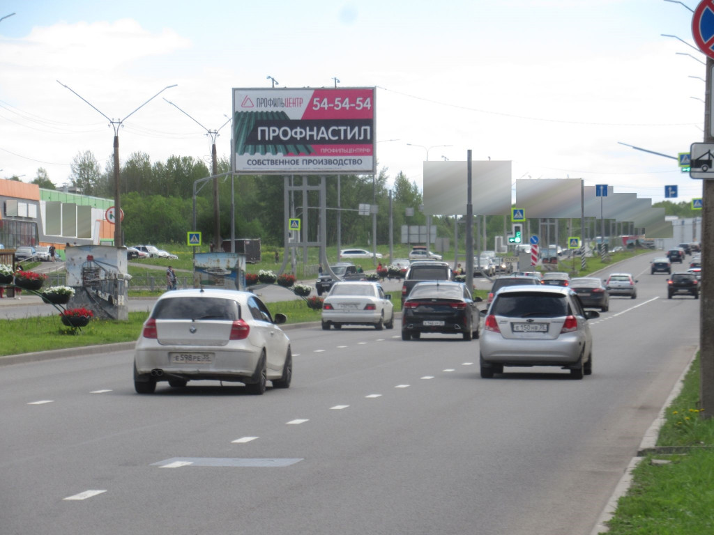 Фотография рекламного носителя, тип: Билборд 3x6, адрес: Октябрьский пр-т., д.69, Череповец, Вологодская область, Россия. Сторона А2 №618061