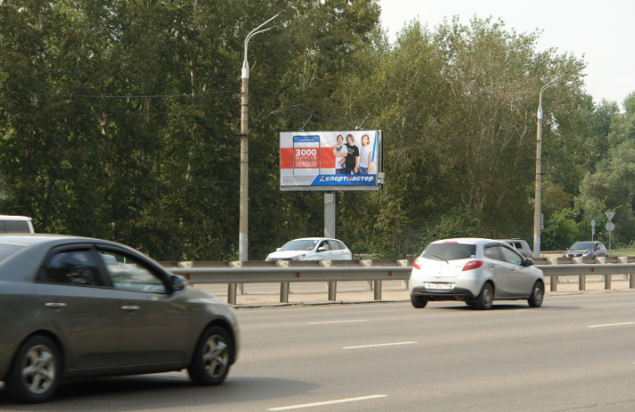 Фотография рекламного носителя, тип: Билборд 3x6, адрес: Октябрьский мост, поз.1, Красноярск, Красноярский край, Россия. Сторона Б №1013147