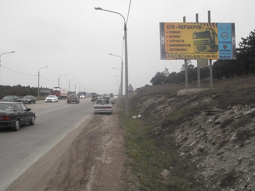 Фотография рекламного носителя, тип: Билборд 3x6, адрес: Новороссийск-Керченский пролив а/д., 9 230м, Новороссийск, Краснодарский край, Россия. Сторона А №587691