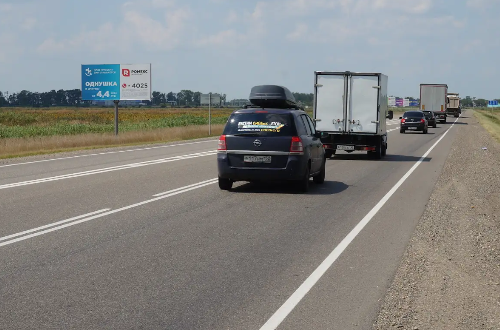 Фотография рекламного носителя, тип: Билборд 3x6, адрес: Краснодар - Славянск-на-Кубани - Крым а/д., 21 227м, Краснодар, Краснодарский край, Россия. Сторона Б №1081577