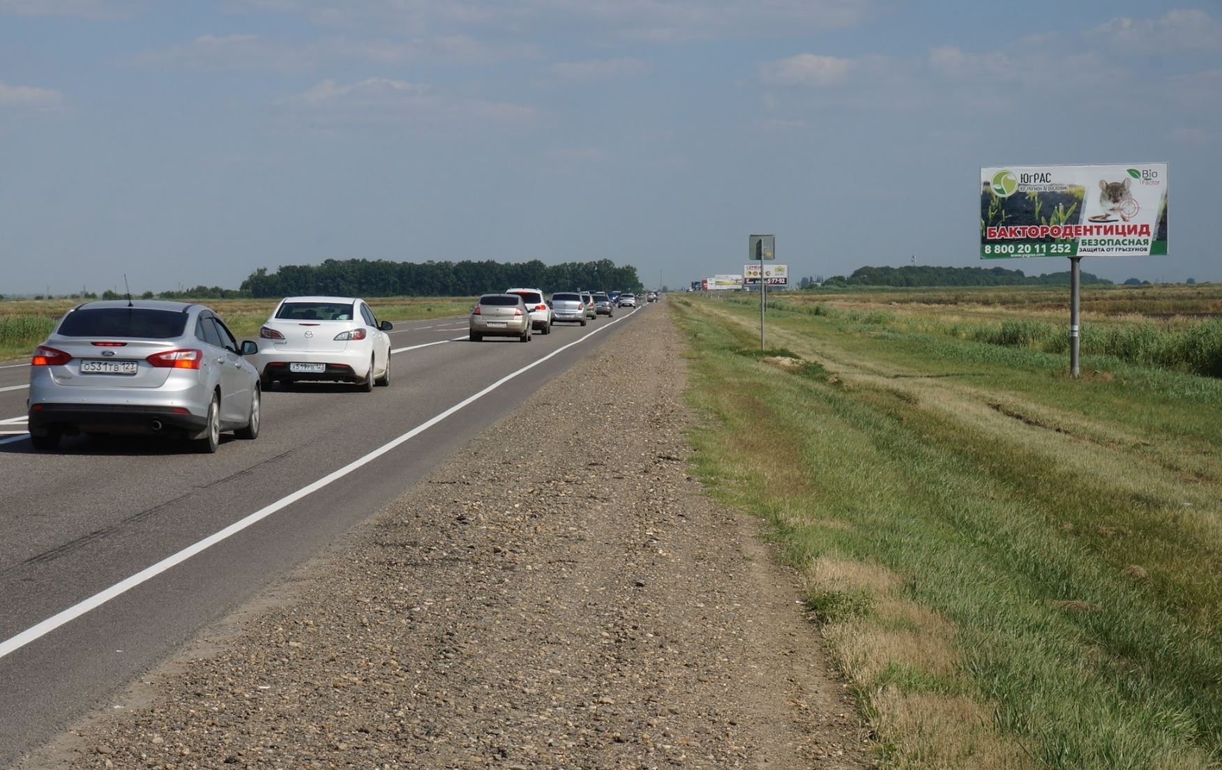 Фотография рекламного носителя, тип: Билборд 3x6, адрес: Краснодар - Славянск-на-Кубани - Крым а/д., 21 227м, Краснодар, Краснодарский край, Россия. Сторона А №1028174