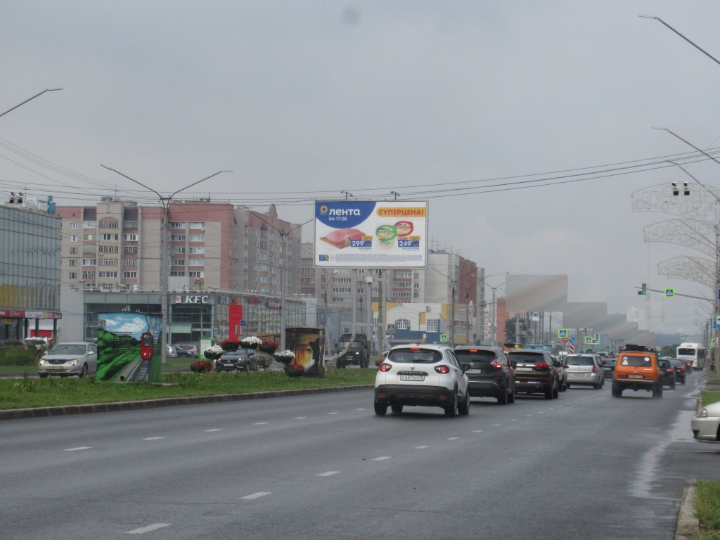Фотография рекламного носителя, тип: Билборд 3x6, адрес: Октябрьский пр-т., д.70, Череповец, Вологодская область, Россия. Сторона А1 №618062