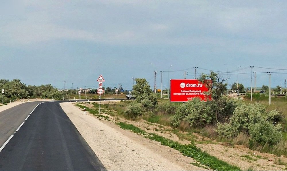 Фотография рекламного носителя, тип: Билборд 3x6, адрес: Темрюк-Порт Кавказ а/д., 1 000м, Краснодарский край, Россия. Сторона А №714589