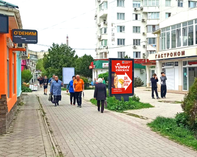 Фотография рекламного носителя, тип: Ситиформат 1.8x1.2, адрес: Старшинова б-р., д.8Д, Феодосия, Республика Крым, Россия. Сторона А №1081146