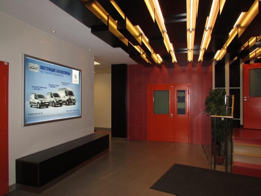 Фотография рекламного носителя, тип: Лайтбокс, адрес: Бизнес-центр «Базен», Шаумяна пр-т., д.4, Санкт-Петербург, Россия. Сторона/вариант A №1013052