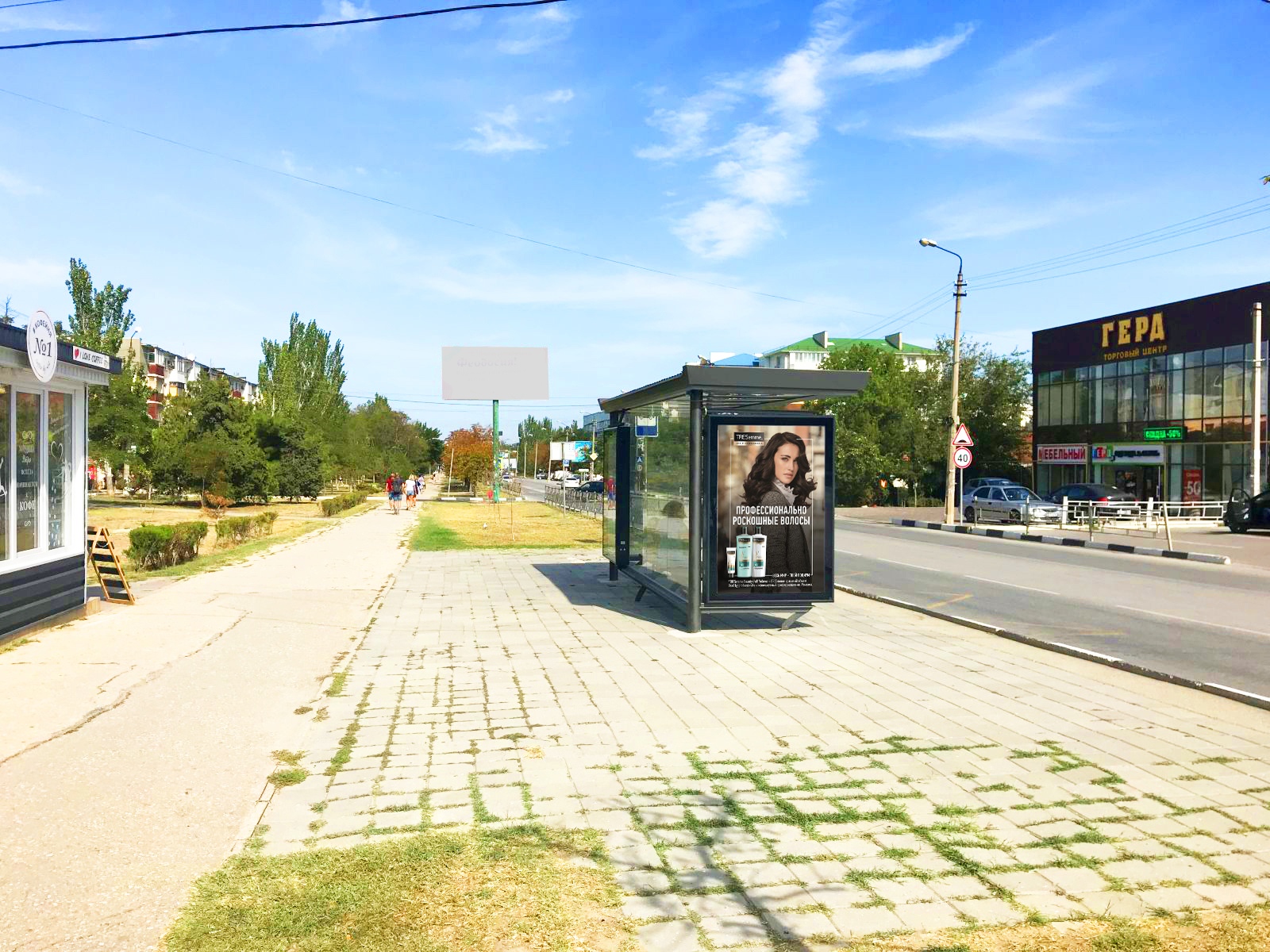 Фотография рекламного носителя, тип: Остановка 1.8x1.2, адрес: Крымская ул. Х Гарнаева ул., д.64, Феодосия, Республика Крым, Россия. Сторона B1 №843709