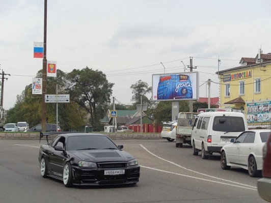 Фотография рекламного носителя, тип: Билборд 3x6, адрес: Блюхера ул. Х Садовая ул., Уссурийск, Приморский край, Россия. Сторона А №791446