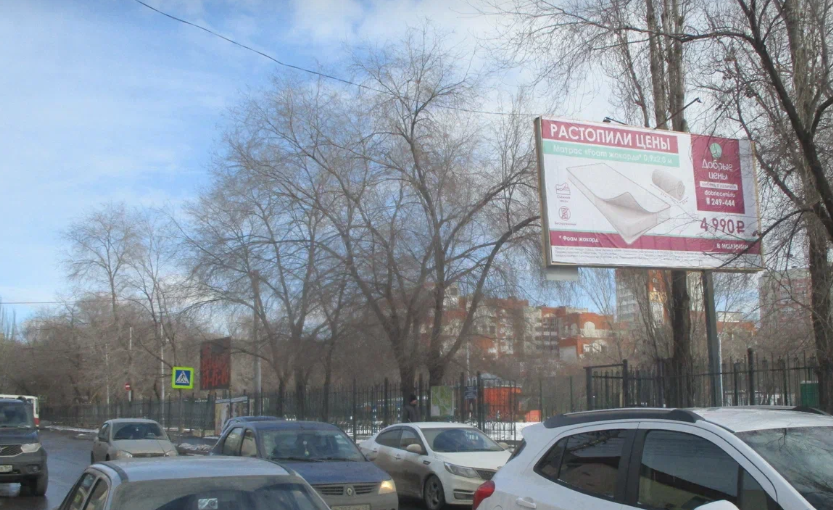 Фотография рекламного носителя, тип: Билборд 3x6, адрес: Астраханская ул. Х Слонова ул., Саратов, Саратовская область, Россия. Сторона Б №1006497