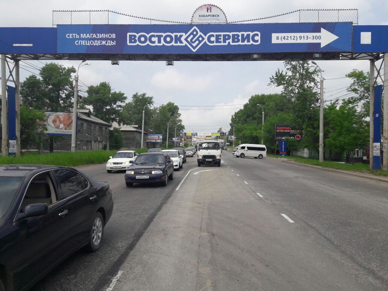 Фотография рекламного носителя, тип: Перетяжка, адрес: 60 лет Октяюря пр-т., д.227, Хабаровск, Хабаровский край, Россия. Сторона Б №971776