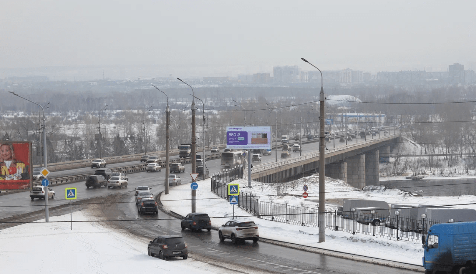 Фотография рекламного носителя, тип: Билборд 3x6, адрес: Октябрьский мост, БЦ "Сириус", Красноярск, Красноярский край, Россия. Сторона А1-А10 №1324149