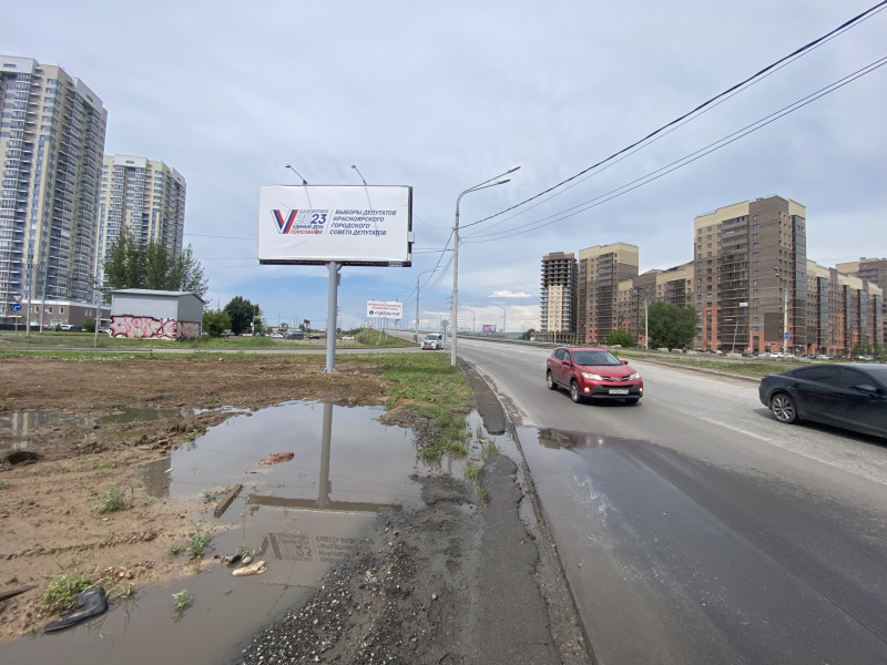 Фотография рекламного носителя, тип: Билборд 3x6, адрес: Авиаторов ул. Х 9 Мая ул., д.64, Красноярск, Красноярский край, Россия. Сторона Б №779802
