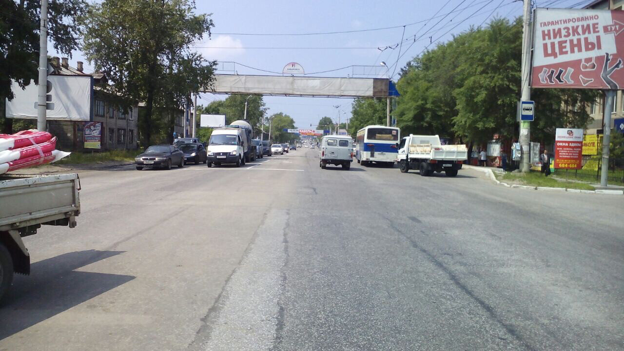 Фотография рекламного носителя, тип: Перетяжка, адрес: 60 лет Октября пр-т., д.158, рест-н Пекин, Хабаровск, Хабаровский край, Россия. Сторона А №971773