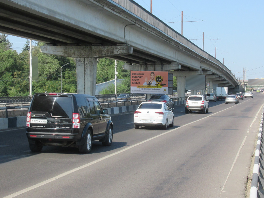 Фотография рекламного носителя, тип: Билборд 3x6, адрес: Северный мост, опора 8, Воронеж, Воронежская область, Россия. Сторона А2 №1058295