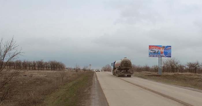 Фотография рекламного носителя, тип: Билборд 3x6, адрес: Волгоград-Донецк а/д. Х Объездная а/д. Х Братьев Дорошевых ул., Ростов-на-Дону, Ростовская область, Россия. Сторона А №719869