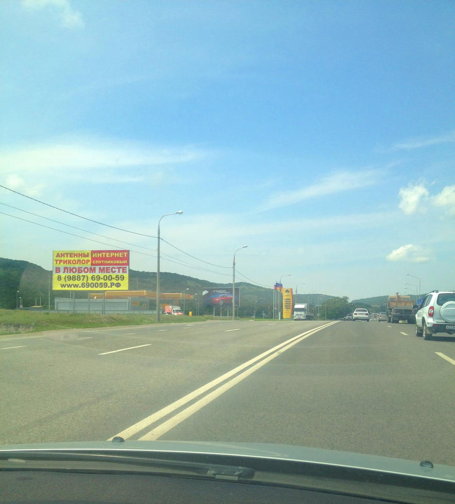 Фотография рекламного носителя, тип: Билборд 3x6, адрес: Новороссийск-Керченский пролив а/д М25, Цемдолина, 8 300м, Новороссийск, Краснодарский край, Россия. Сторона Б №1021065