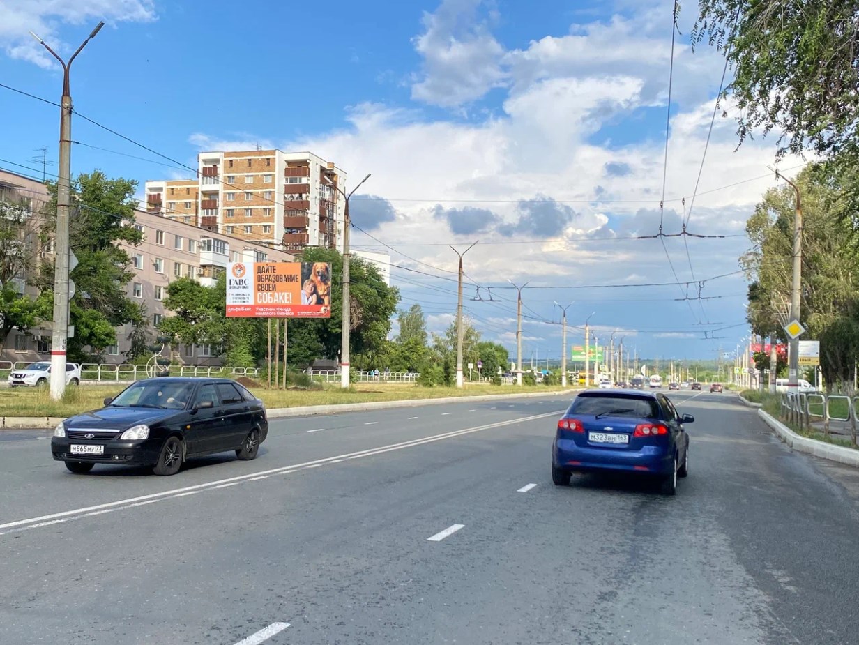 Фотография рекламного носителя, тип: Билборд 3x6, адрес: Победы пр-т., д.45 X Карбышева ул., Новокуйбышевск, Самарская область, Россия. Сторона B №1325320