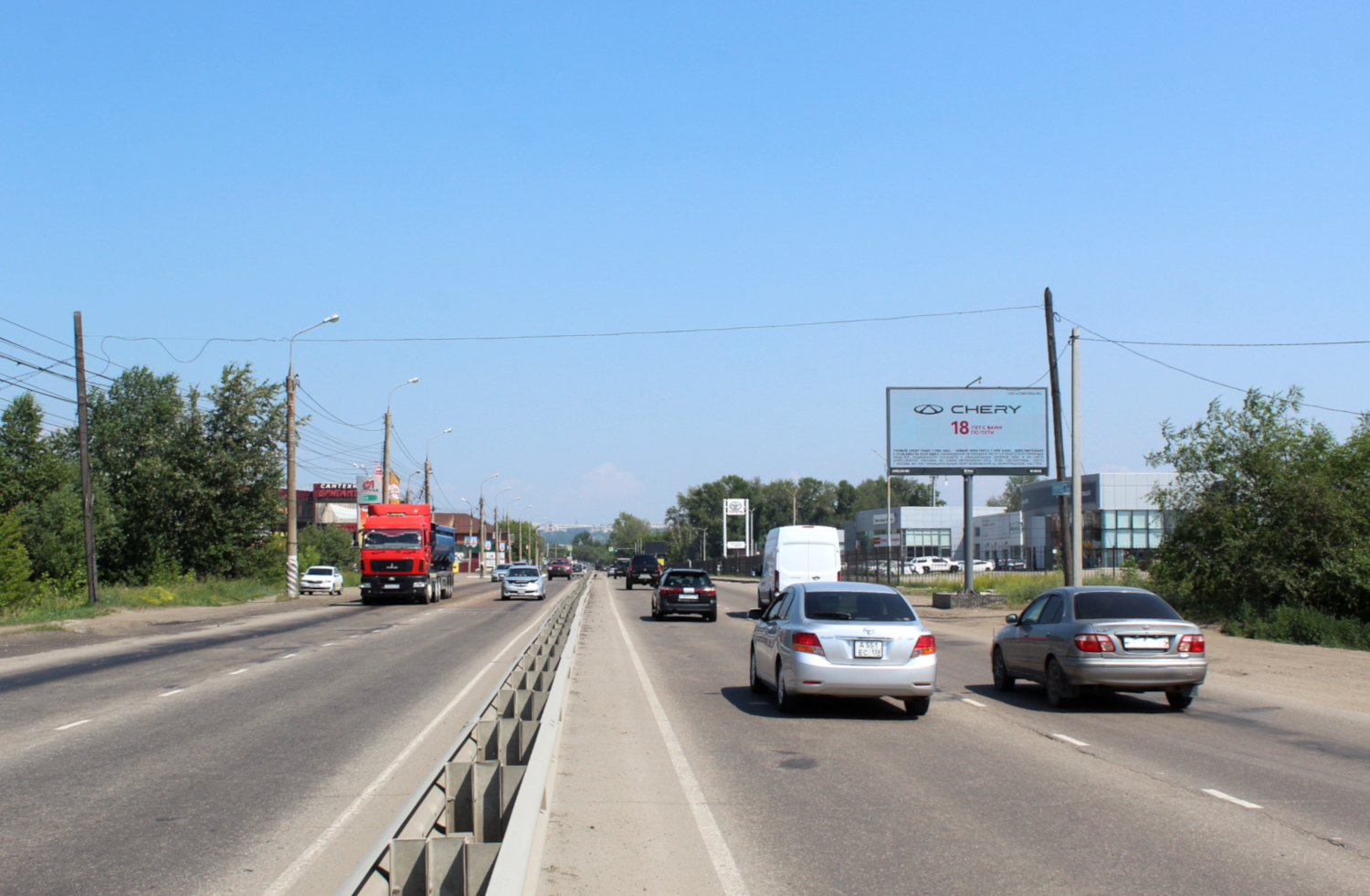 Фотография рекламного носителя, тип: Билборд 3x6, адрес: Олега Кошевого ул. Х Кедровая ул., поз.1, Иркутск, Иркутская область, Россия. Сторона А1 №1325078