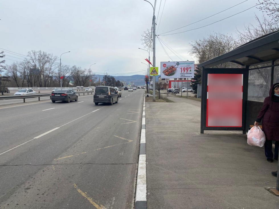 Фотография рекламного носителя, тип: Остановка 1.8x1.2, адрес: Шахтеров ул. Х Енисейская ул., д.2а, Красноярск, Красноярский край, Россия. Сторона А №1029770