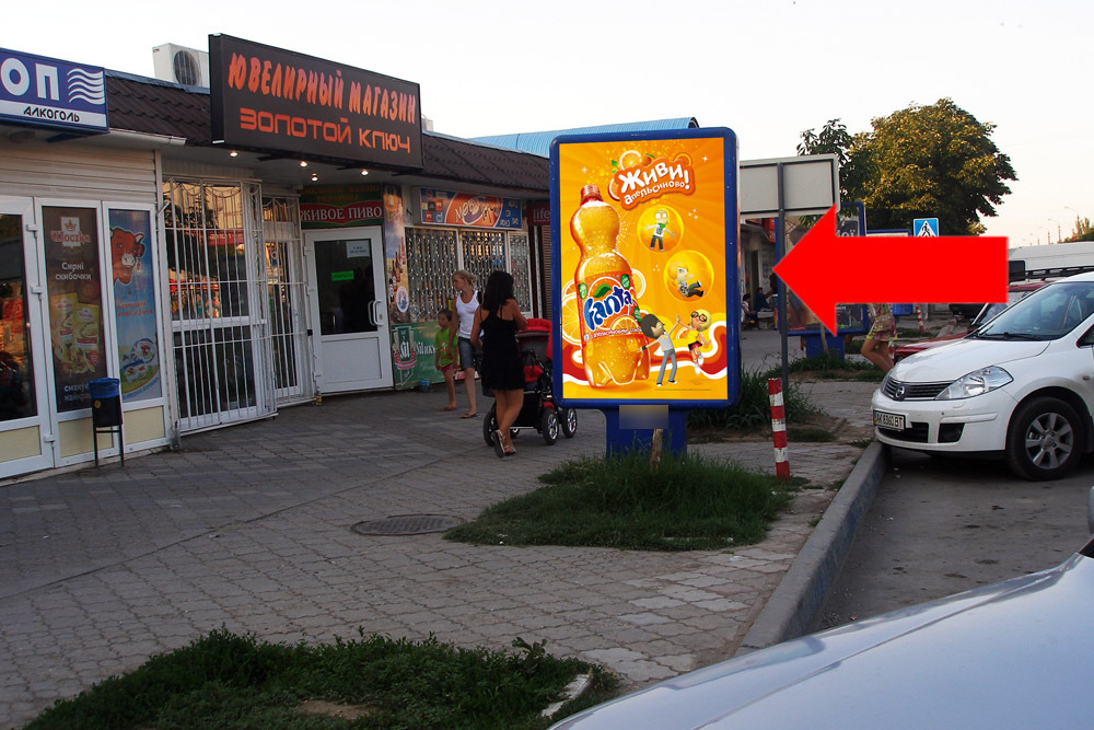 Фотография рекламного носителя, тип: Ситиформат 1.8x1.2, адрес: Крымская ул., продуктовый рынок, напротив аптеки, Феодосия, Республика Крым, Россия. Сторона B №384707