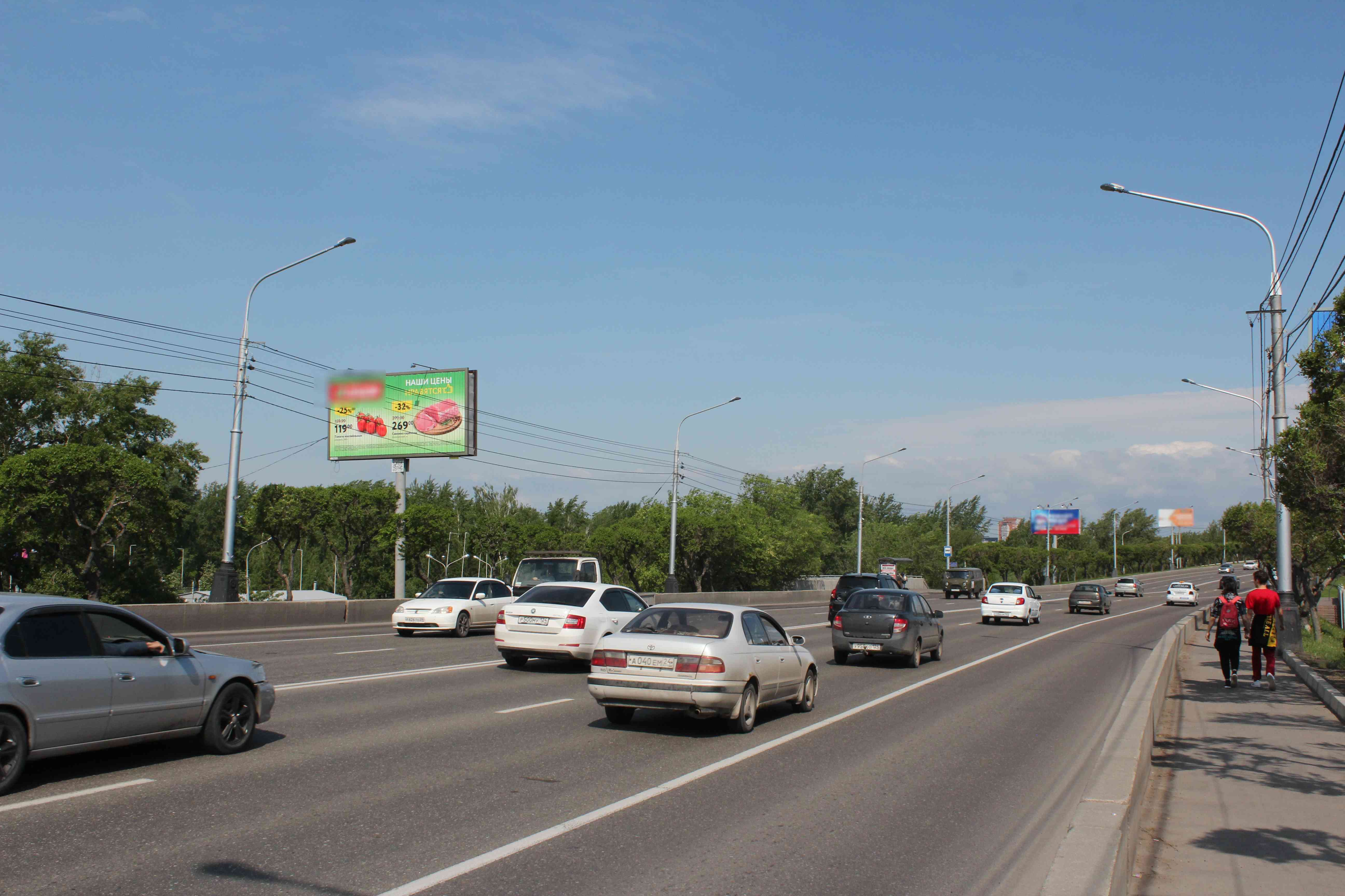 Фотография рекламного носителя, тип: Билборд 3x6, адрес: Коммунальный мост, ост. "Остров Отдыха", Красноярск, Красноярский край, Россия. Сторона Б1-Б3 №820617