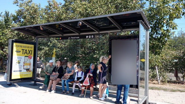 Фотография рекламного носителя, тип: Остановка 1.8x1.2, адрес: Евпаторийское ш., ост. "ул. Ракетная", Симферополь, Республика Крым, Россия. Сторона A1 №796563