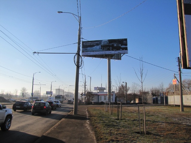Фотография рекламного носителя, тип: Суперсайт 5x15, адрес: Дзержинского ул. Х Взлетная ул., Краснодар, Краснодарский край, Россия. Сторона А №409594