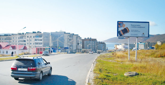 Фотография рекламного носителя, тип: Билборд 3x6, адрес: Портовая ул., д.16/2, Магадан, Магаданская область, Россия. Сторона A №1060489