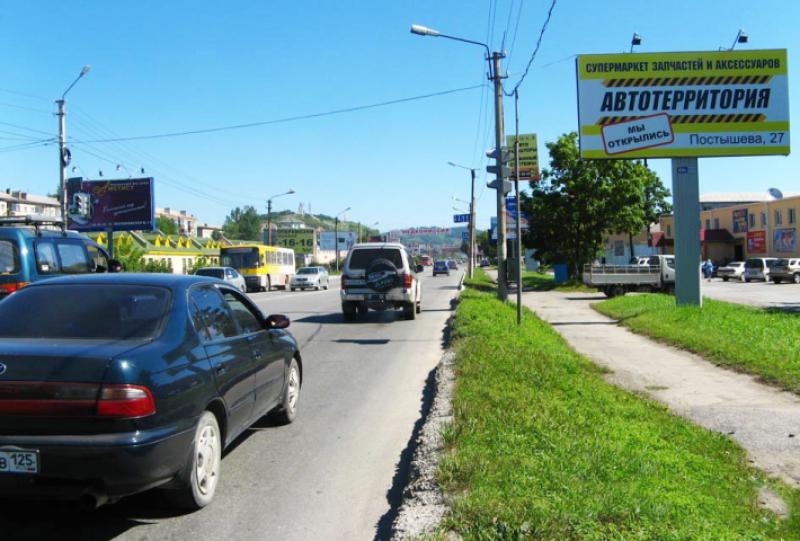 Фотография рекламного носителя, тип: Билборд 3x6, адрес: Постышева ул., д.2, Находка, Приморский край, Россия. Сторона А №407397