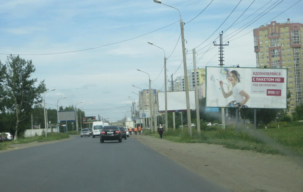 Фотография рекламного носителя, тип: Билборд 3x6, адрес: Архитекторов б-р., д.14а, поз.2, Омск, Омская область, Россия. Сторона А №1009711