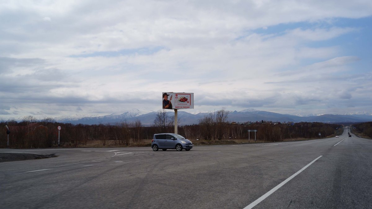 Фотография рекламного носителя, тип: Билборд 3x6, адрес: Федеральная трасса, 20 000м, поз.1, Петропавловск-Камчатский, Камчатский край, Россия. Сторона Б №777490