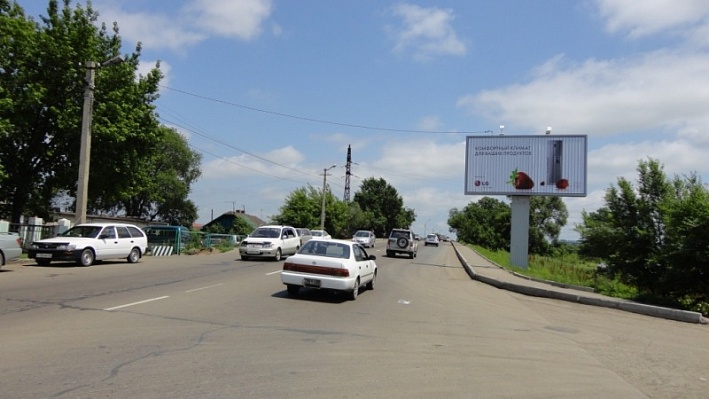 Фотография рекламного носителя, тип: Билборд 3x6, адрес: Чичерина ул., автовокзал, рынок, мост №1, Уссурийск, Приморский край, Россия. Сторона А1-А3 №791455