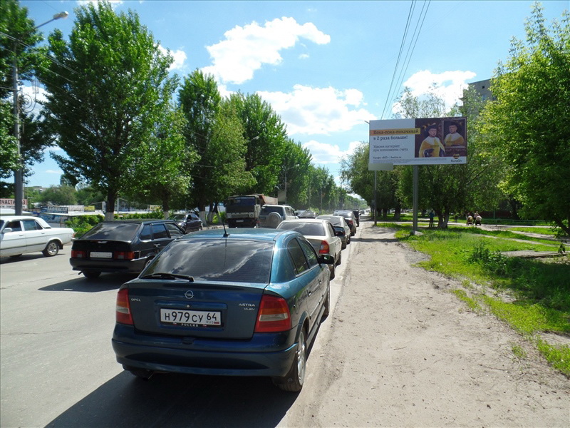 Фотография рекламного носителя, тип: Билборд 3x6, адрес: Ново-Астраханское ш., д.83, Саратов, Саратовская область, Россия. Сторона А №819232