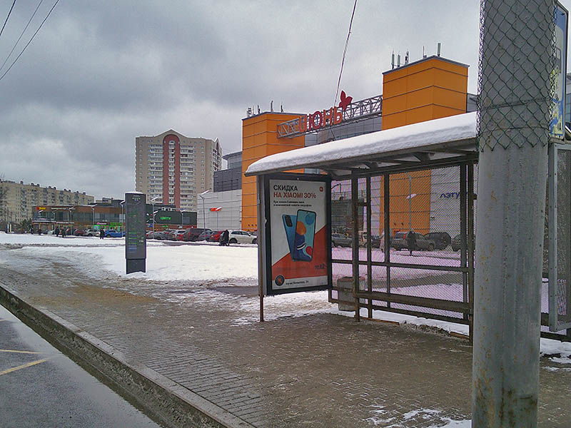 Фотография рекламного носителя, тип: Остановка 1.8x1.2, адрес: Индустриальный пр-т., д.24 Х Энтузиастов пр-т., Санкт-Петербург, Россия. Сторона A №1094392