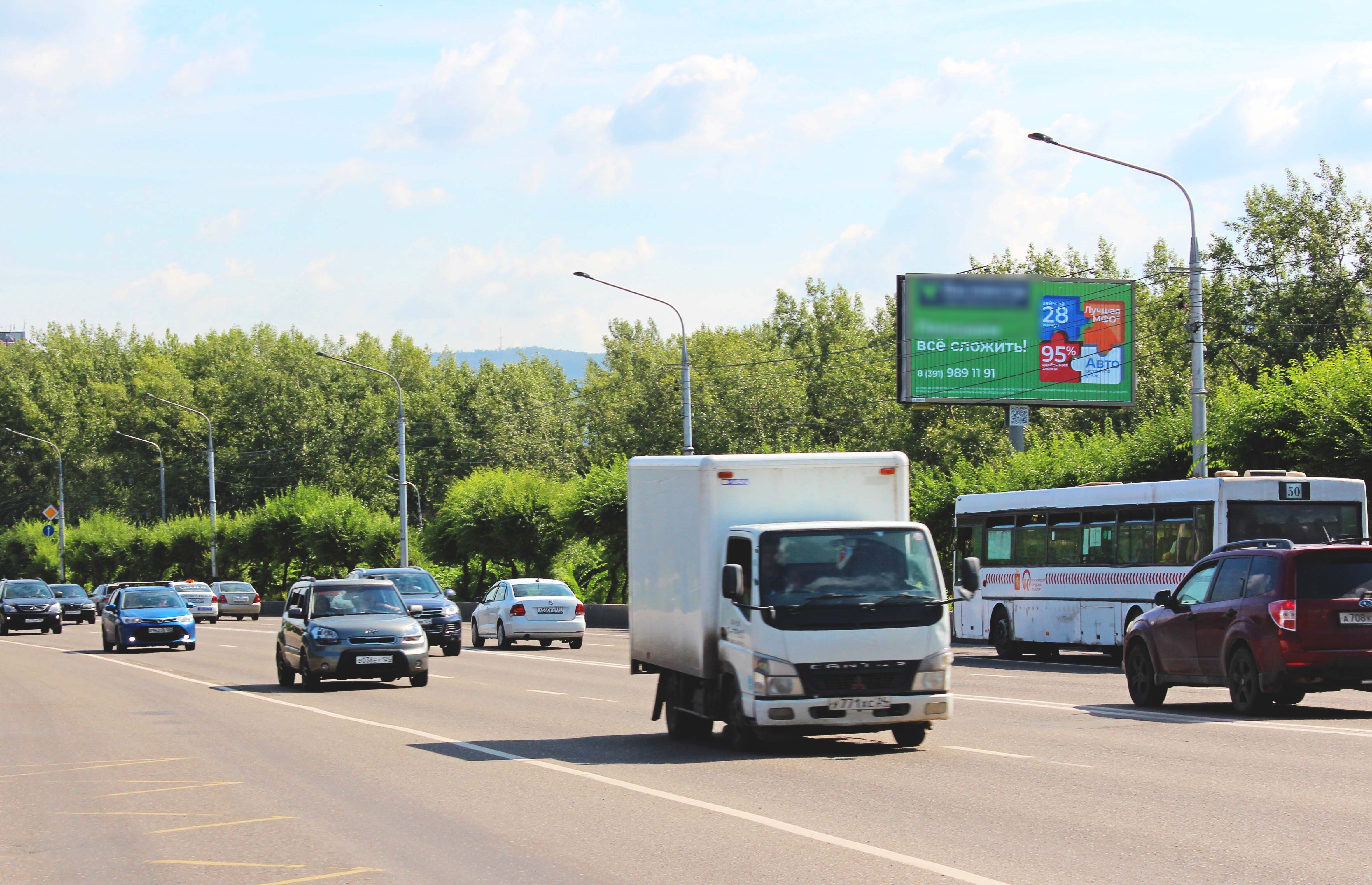Фотография рекламного носителя, тип: Билборд 3x6, адрес: Коммунальный мост, ост. "Остров Отдыха", Красноярск, Красноярский край, Россия. Сторона А1-А3 №820616