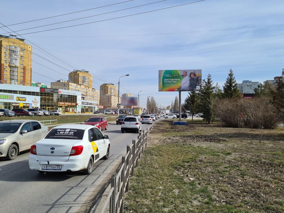 Фотография рекламного носителя, тип: Билборд 3x6, адрес: Архитекторов б-р., д.7, корп.2, Омск, Омская область, Россия. Сторона А №1009705