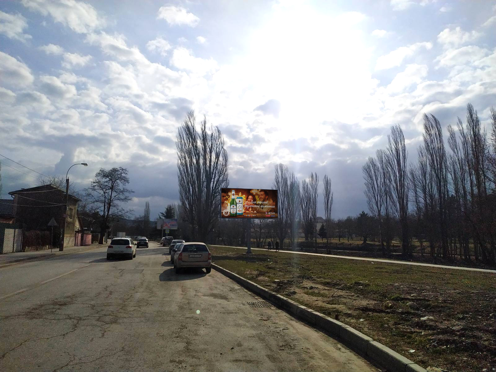 Фотография рекламного носителя, тип: Билборд 3x6, адрес: Гурзуфская ул., д.10, поз.2, Симферополь, Республика Крым, Россия. Сторона A №799565
