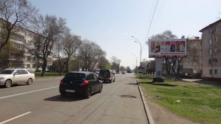 Фотография рекламного носителя, тип: Билборд 3x6, адрес: Комсомольская ул., д.60, Уссурийск, Приморский край, Россия. Сторона А №791380