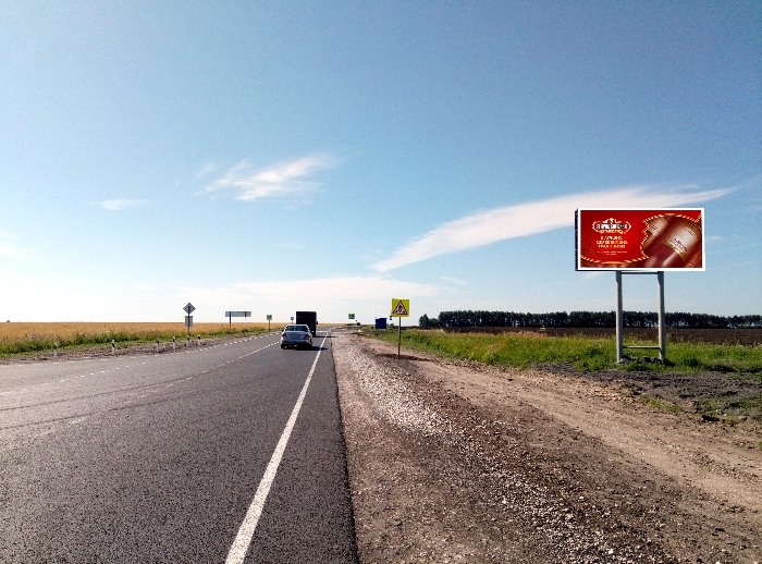 Фотография рекламного носителя, тип: Билборд 3x6, адрес: Рязань-Пронск-Скопин а/д., 70 200м. справа, Рязанская область, Россия. Сторона А №804211