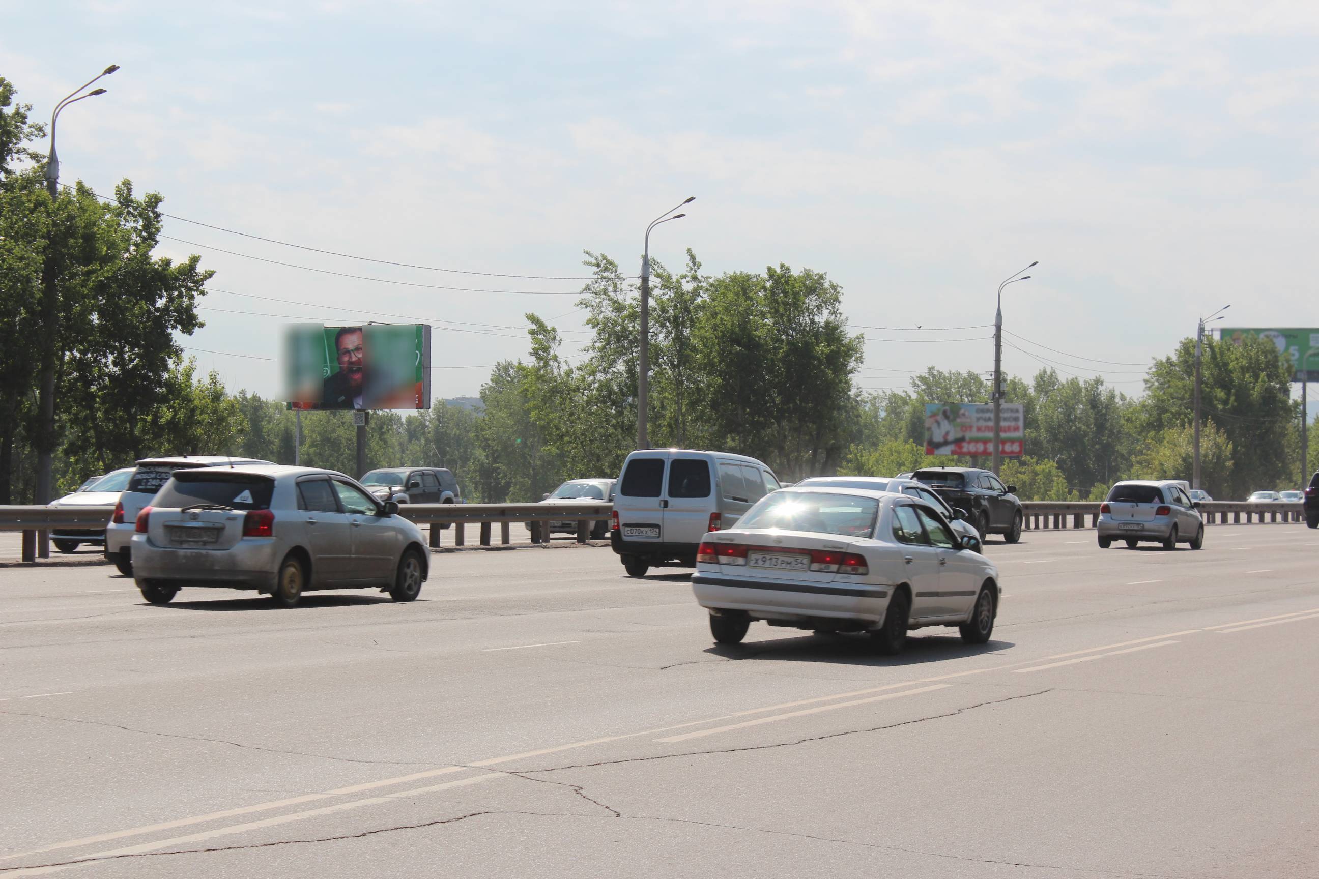 Фотография рекламного носителя, тип: Билборд 3x6, адрес: Татышев остров, 78 м до въезд-выезд с острова, Красноярск, Красноярский край, Россия. Сторона Б №819893